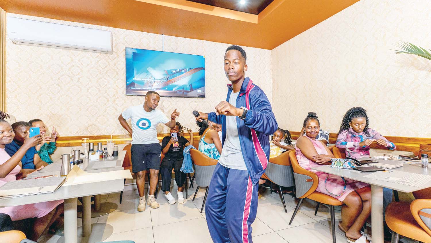 Host comedian Cedric showing off some interesting dance moves.